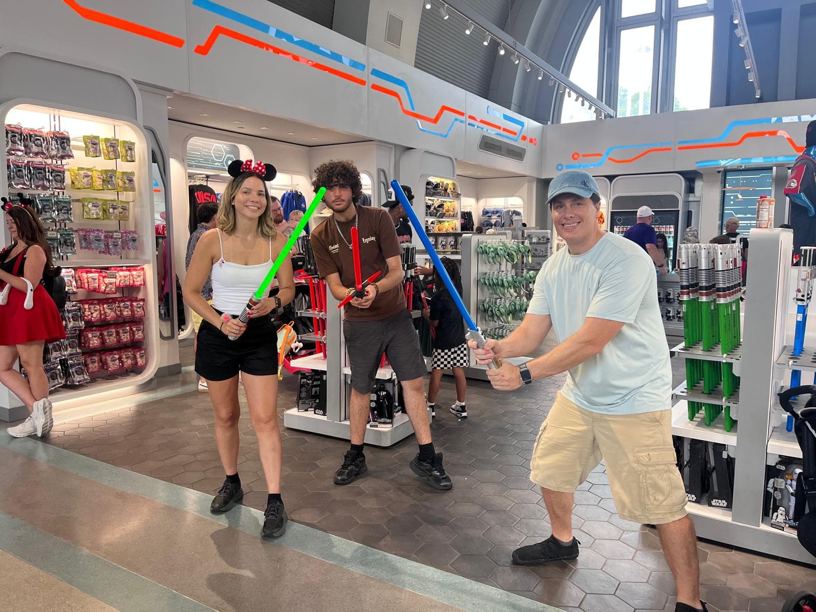 James MacWilliam wielding a lightsaber